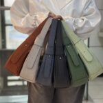 کيف پاسپورتي زنانه هلالي راه راه