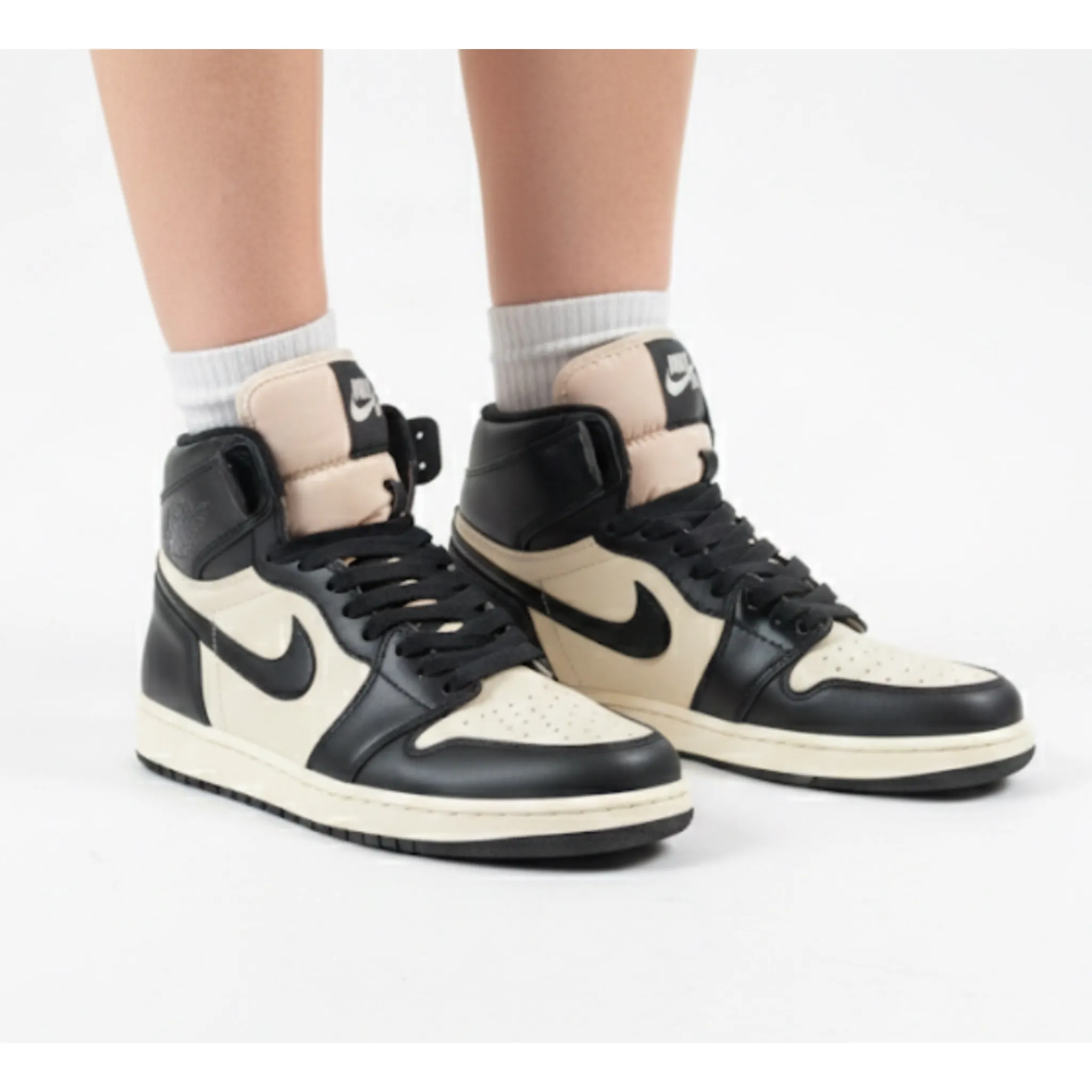 photo-output-2025-11-09T113807.314-1 کتونی زنانه جردن ساقدار کرم مشکی ورنی - Image 1