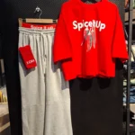 ست سه تکه Spice it up رنگ قرمز شامل تیشرت اورسایز طرح فلفل و شلوار بگ طوسی در مزون رم